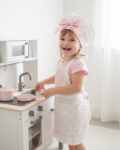 Kecelja za devojčice (Bela sa rozim tufnama)