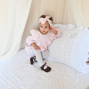 bebi-bodic-exclusive-svetlo-rozi-sa-zlatnim-tackicama-devojčica